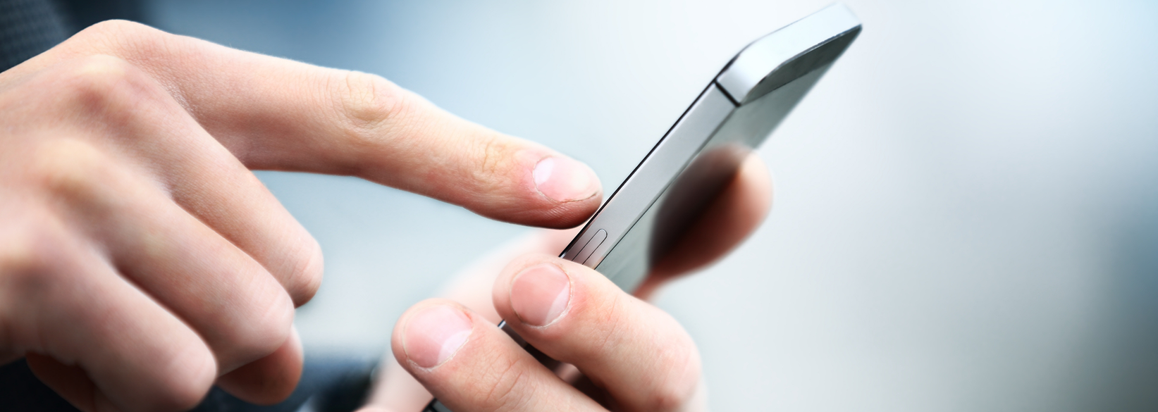 Tapping screen of smart phone with finger